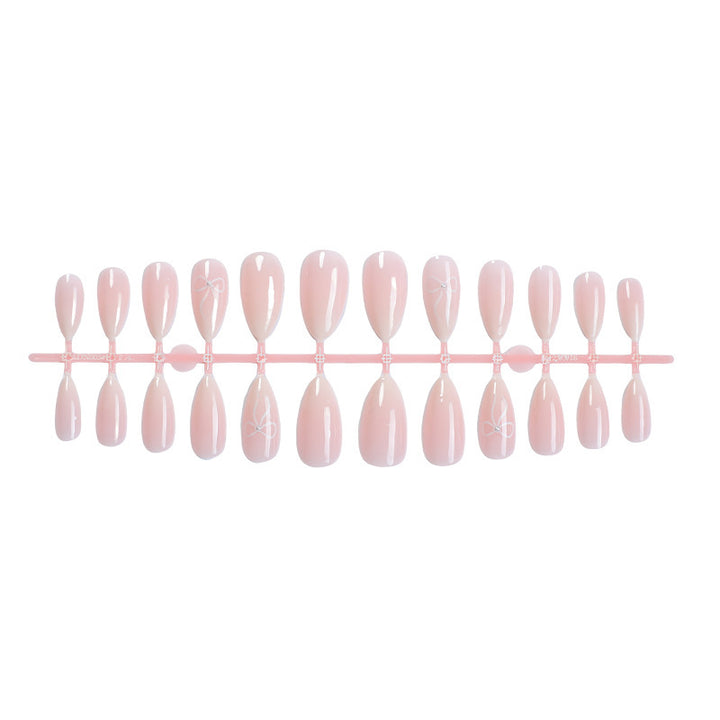 Artificial nail set with elegant designs and subtle accents Bowlift