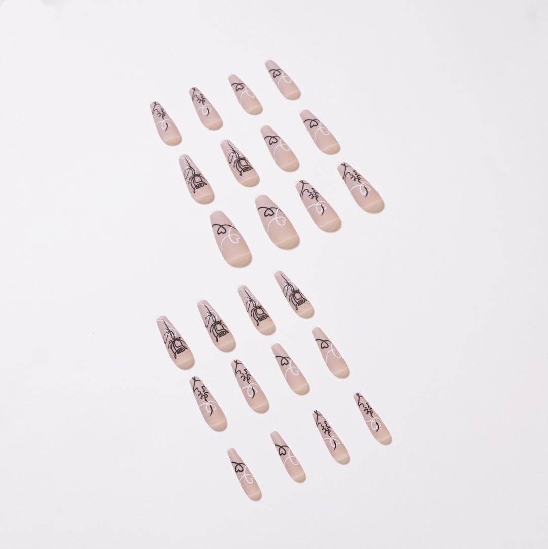 Artful nail extensions with creative line and heart design Bowlift