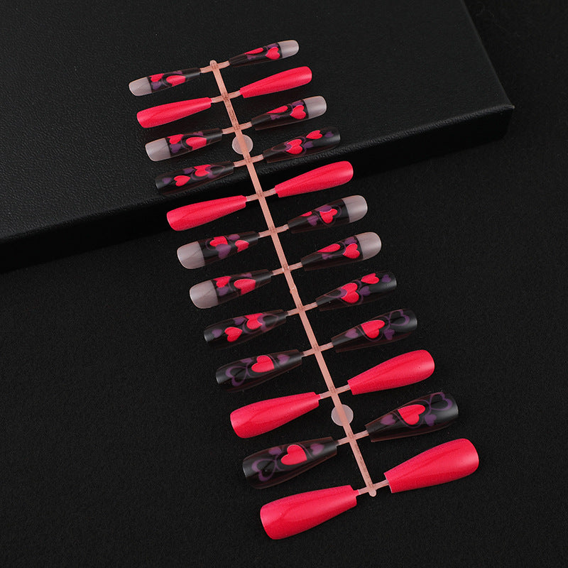 Fake nails in an eye-catching heart design Bowlift