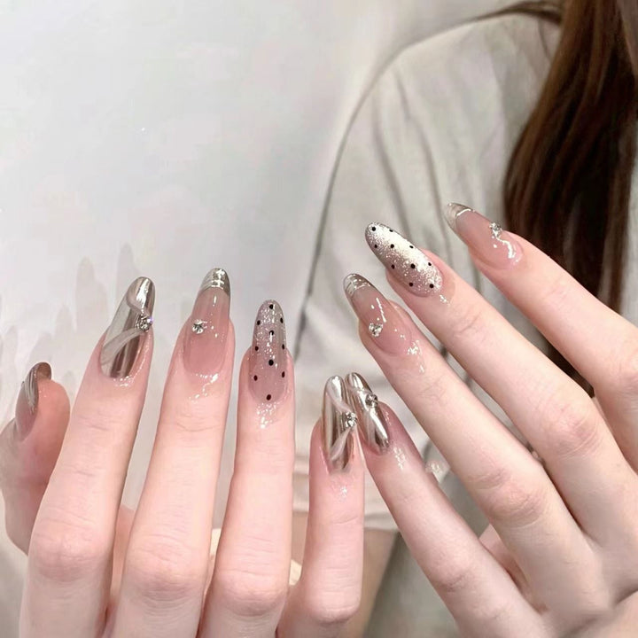 Artistic Stiletto Press-On Nail Set with Unique Design Elements Bowlift