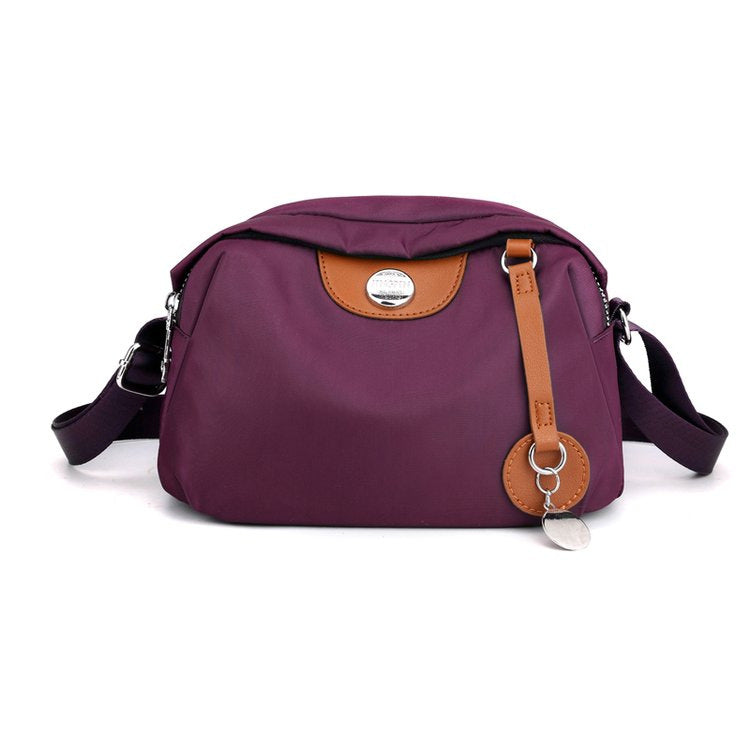 Shoulder bag with adjustable shoulder strap and clear compartment system Bowlift