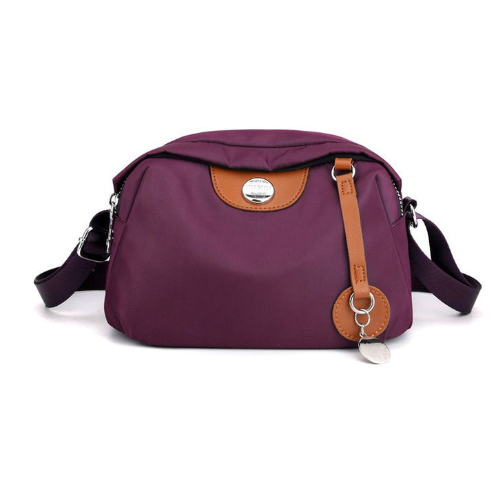 Shoulder bag with adjustable shoulder strap and clear compartment system Bowlift