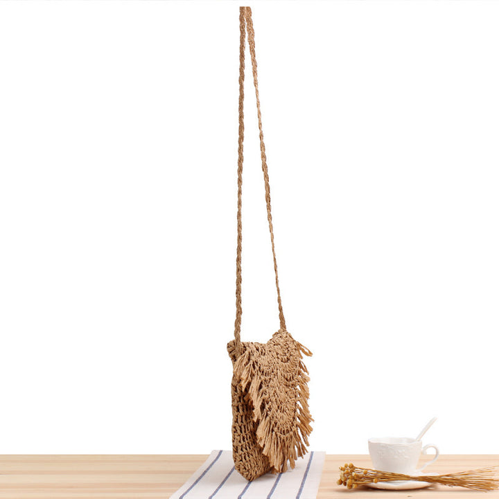 Handcrafted macrame shoulder bag with fringed design Bowlift