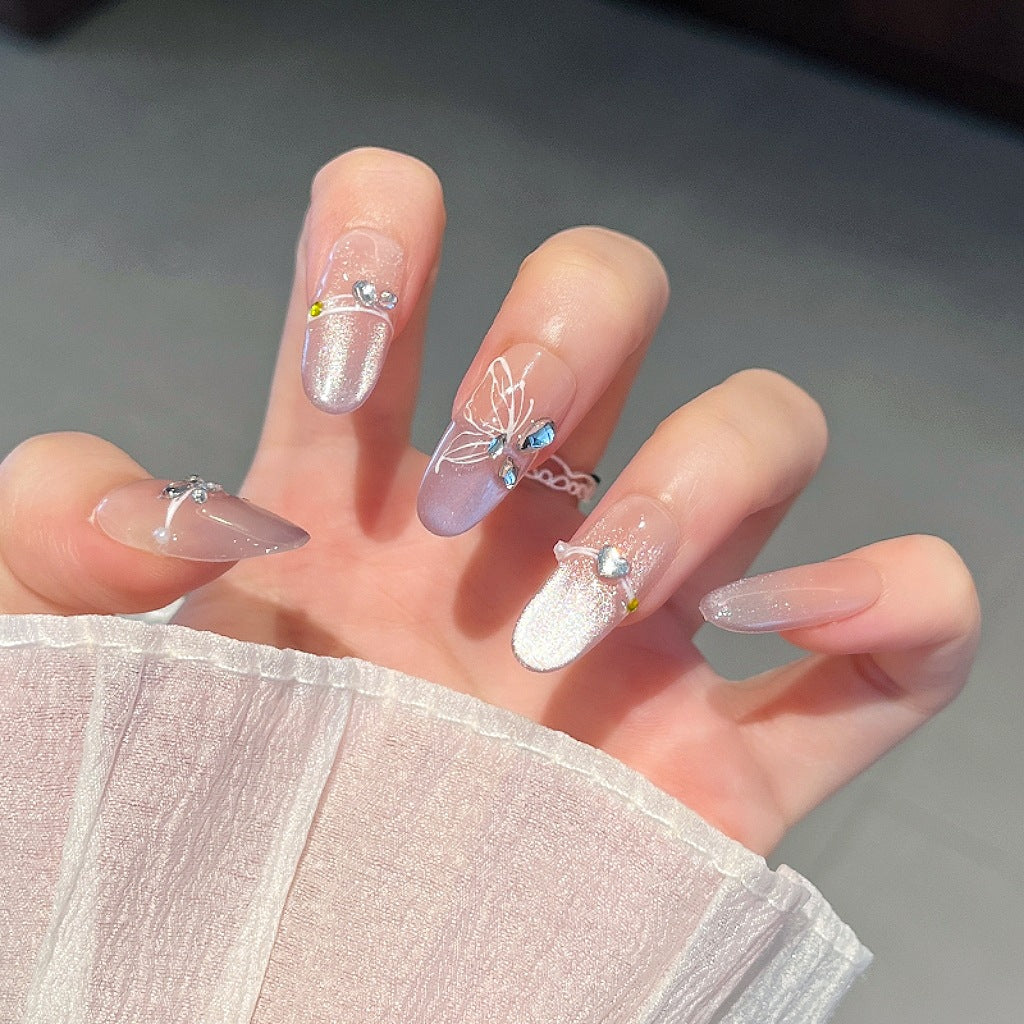 Elegant Nail Art Extensions with Pearl Accents Bowlift