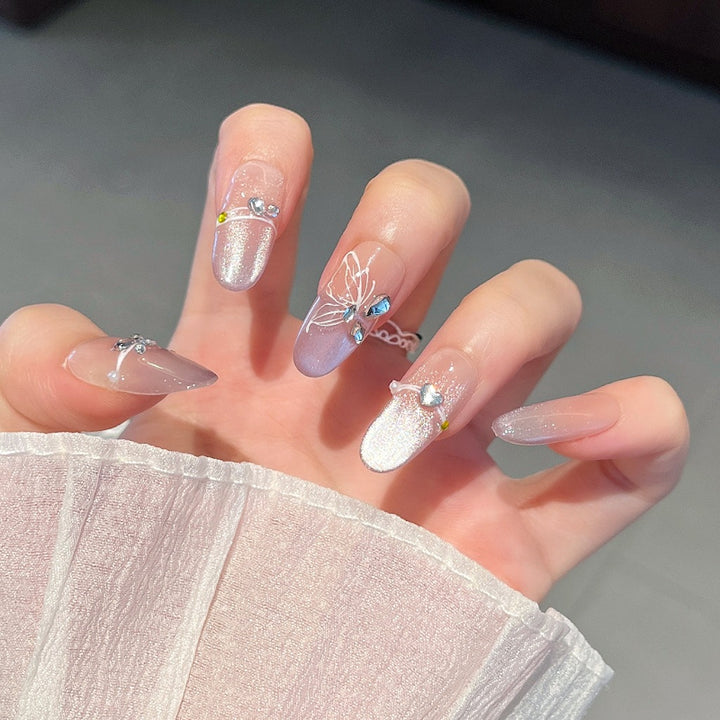 Elegant Nail Art Extensions with Pearl Accents Bowlift