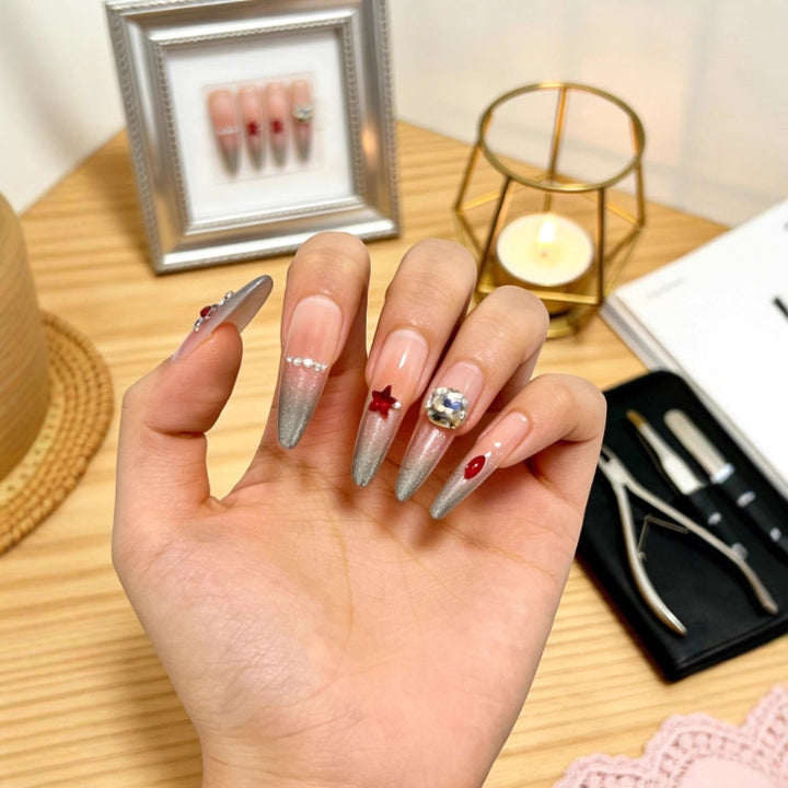 Glamorous artificial nails with rhinestones and embellishments Bowlift