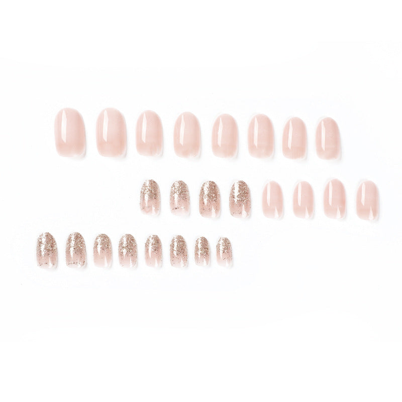 Artful nail art with rhinestone embellishments and elegant gradient color Bowlift