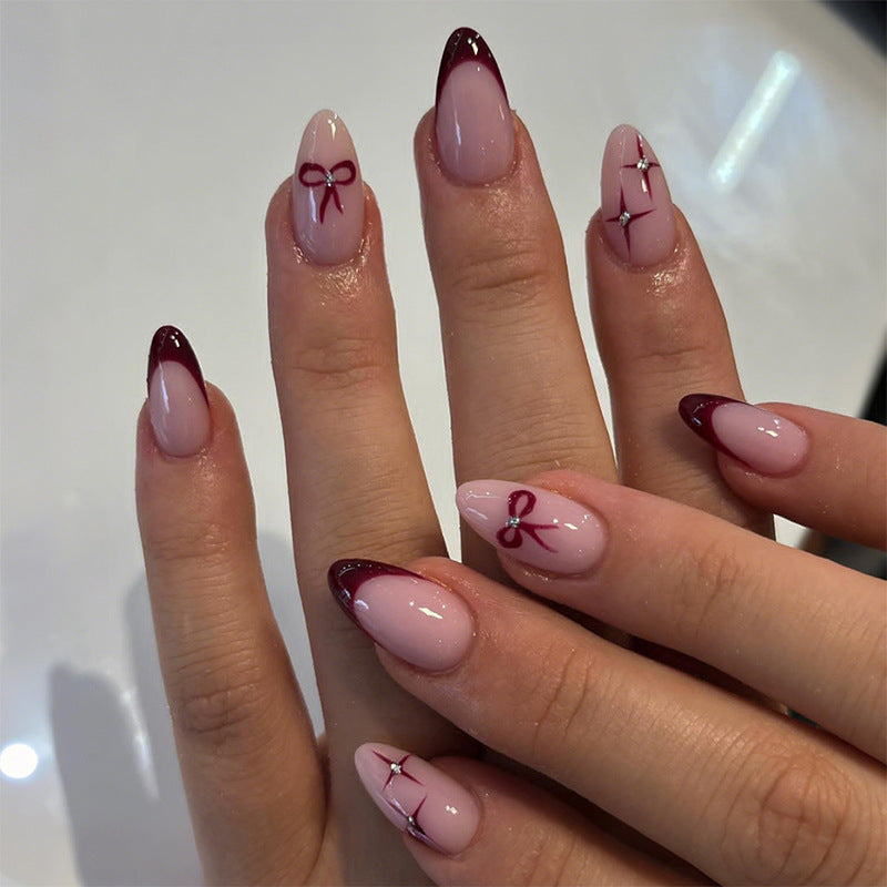 Creative artificial nail set with elegant bow and gradient design Bowlift