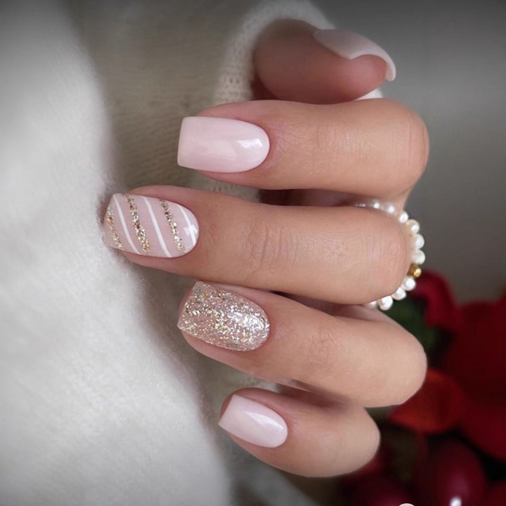Glamorous artificial nails with glitter and ombre Bowlift