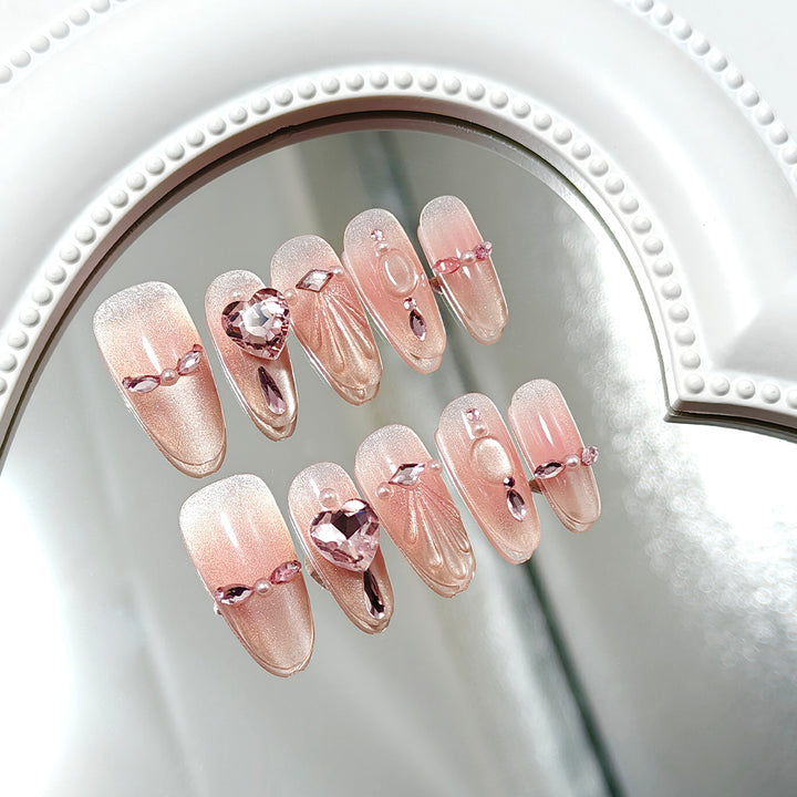 Elegant artificial nails with glitter accents Bowlift