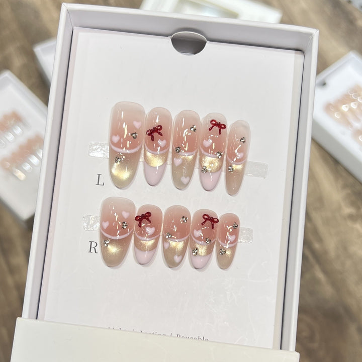 Decorative Press-On Nail Set with Heart and Bow Accents Bowlift