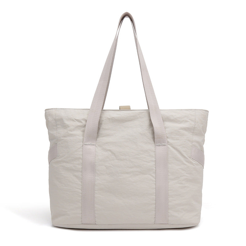Stylish tote bag with spacious main compartment and reinforced handles Bowlift