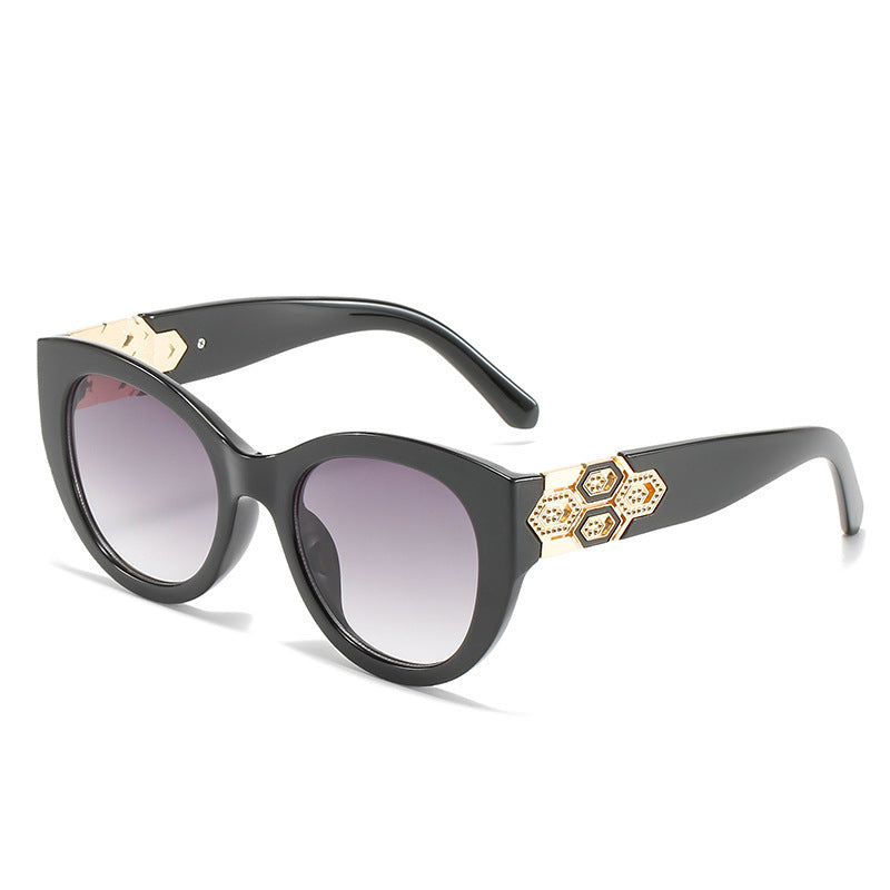Fashion-Forward Cat-Eye Sunglasses with Decorative Accents Bowlift