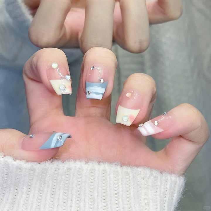 Artistic Press-On Nails with Rhinestone Accents Bowlift