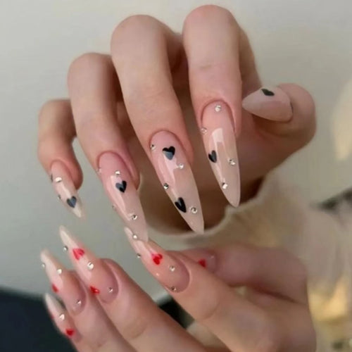 Glamorous artificial nails with heart accents Bowlift