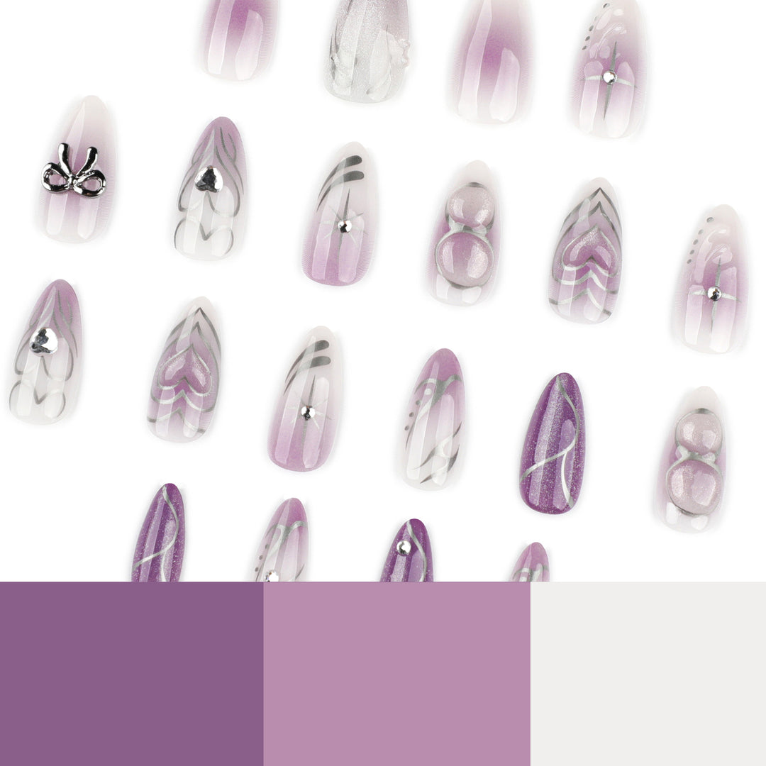 Artful Nail Art with Shiny Accents and Delicate Lilac Bowlift