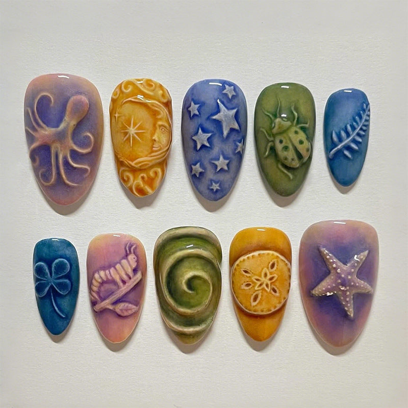 Artificial nail set with creative maritime and nature-inspired motifs Bowlift