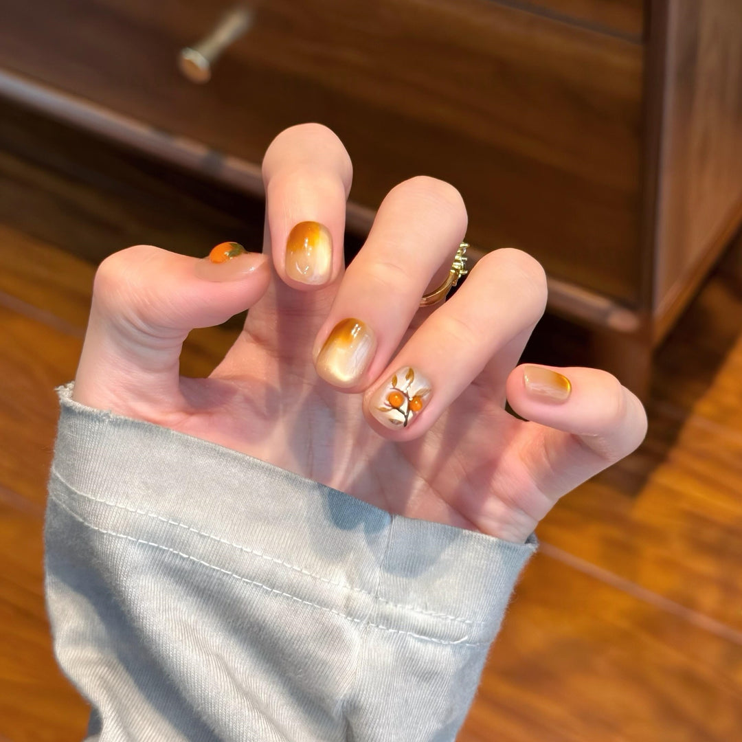 Artificial nails in elegant ombre look with floral accent Bowlift