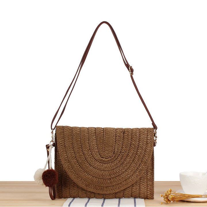 Shoulder bag made of braided natural material with original wave pattern Bowlift