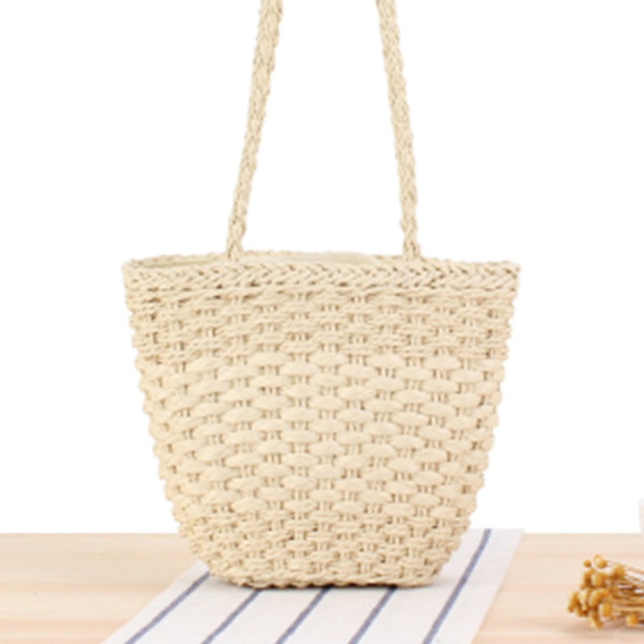 Braided handbag made of natural raffia with robust carrying straps Bowlift