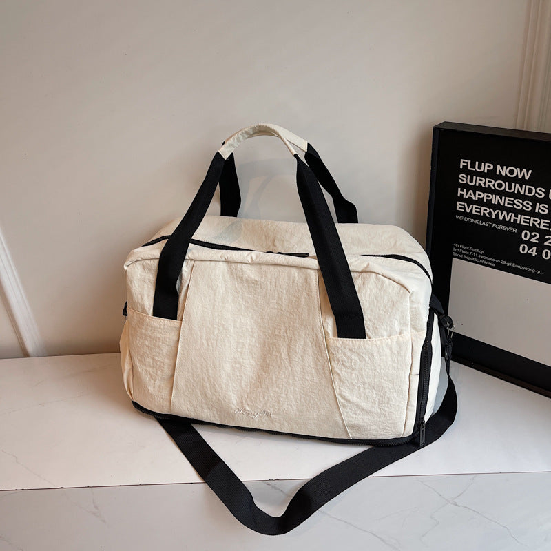 Sporty travel bag with practical outer pockets Bowlift