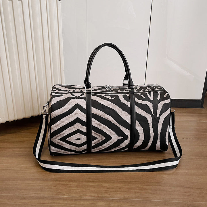 Sporty travel bag in trendy zebra pattern Bowlift