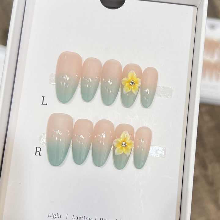 Elegant Ombre Press-On Nail Set with Floral Accents Bowlift