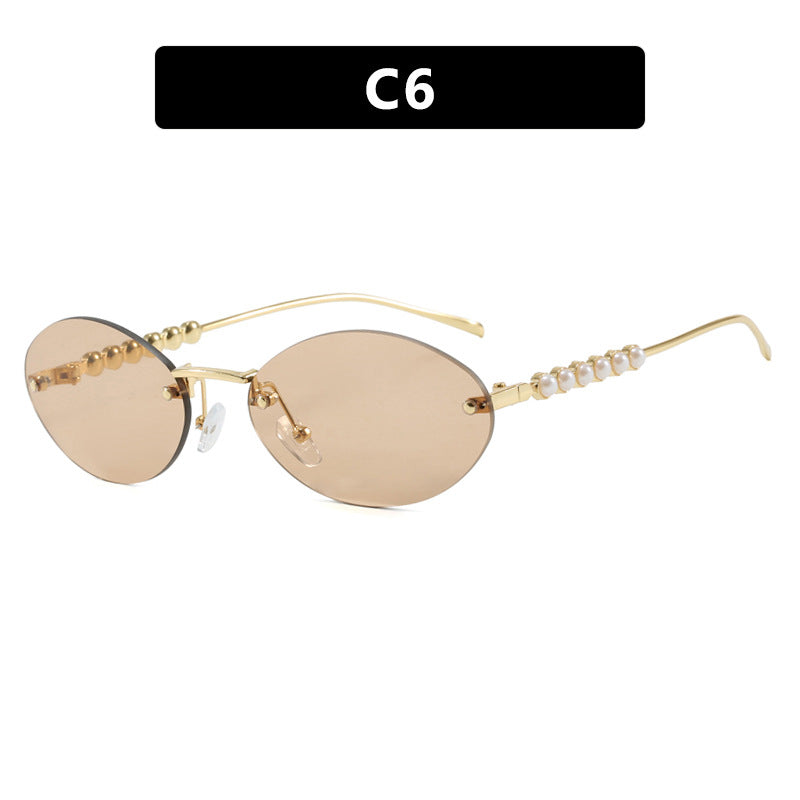 Women's stylish oval sunglasses with elegant embellishments Bowlift
