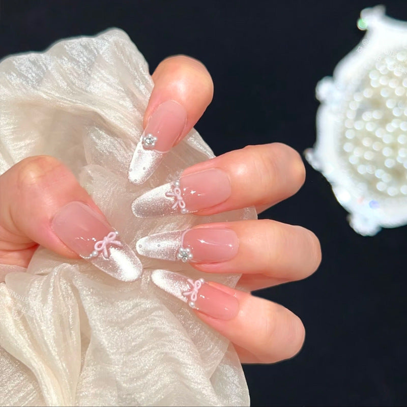 Artificial nail set with elegant bow and rhinestone embellishments Bowlift