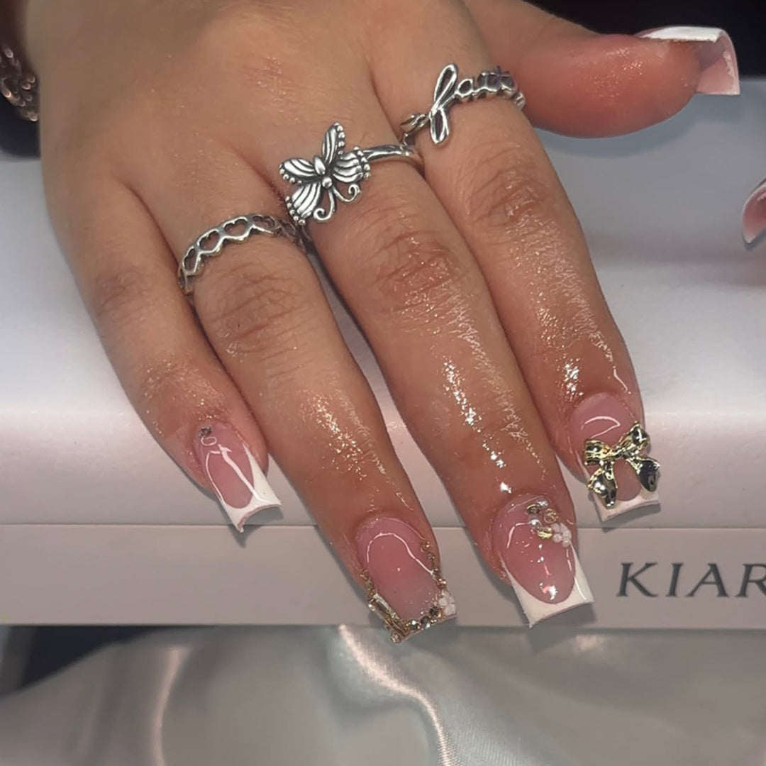 Artful Nail Art with Flower Design and Blue French Tip Bowlift