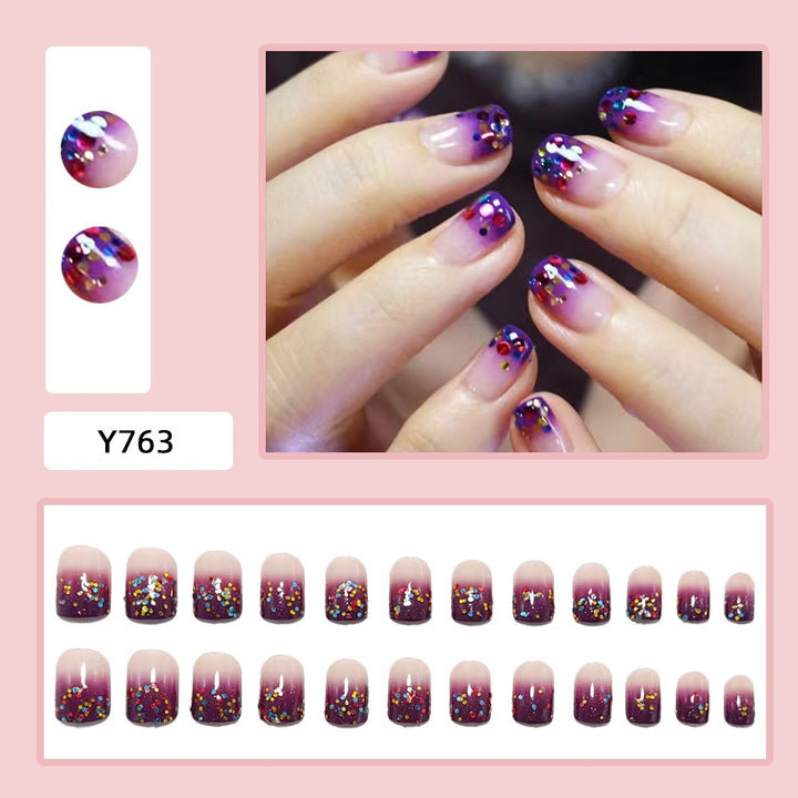 Artificial nails with glitter gradient and colorful accent Bowlift