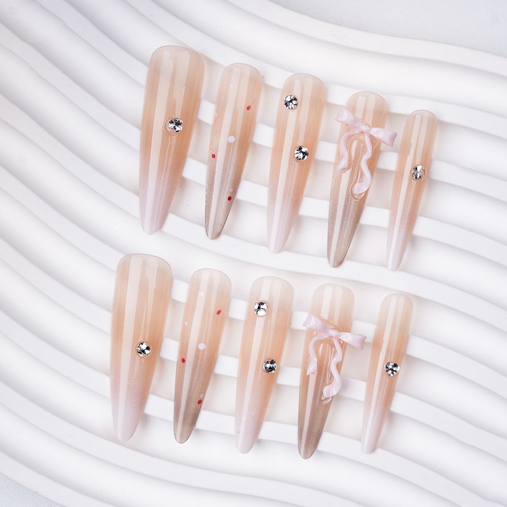 Artistic Stiletto Press-On Nail Set with Decorative Accents Bowlift