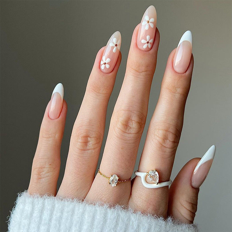 Artful stiletto nails with floral accents Bowlift