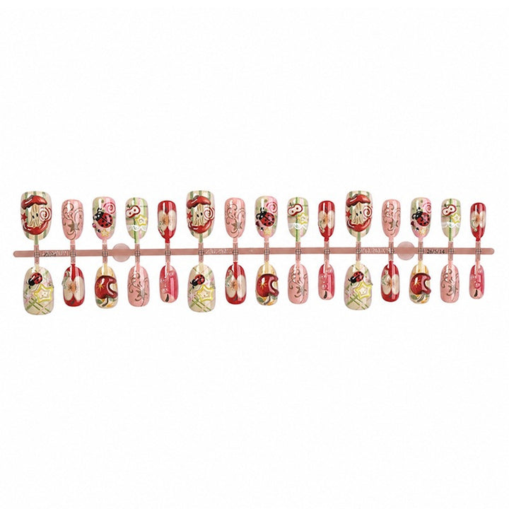 Creative nail art set with playful designs and glitter accents Bowlift