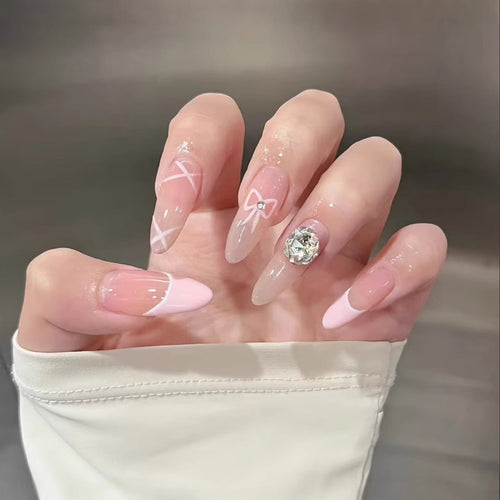 Artistic Press-On Nail Set with Floral and Gemstone Accents Bowlift