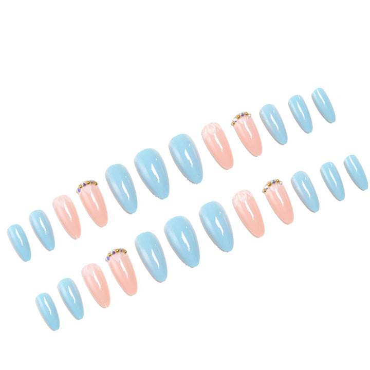 Artificial nails with elegant leaf patterns and rhinestone embellishments Bowlift