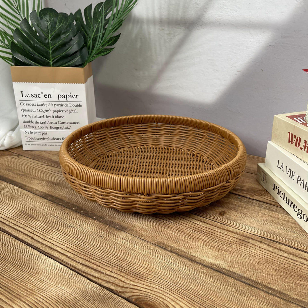 Women’s round serving basket made of woven rattan Bowlift