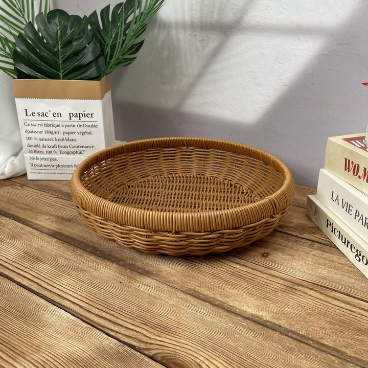 Women’s round serving basket made of woven rattan Bowlift