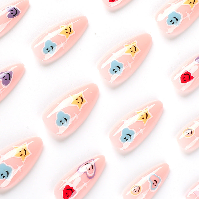 Creative nail art with playful emoji motifs Bowlift