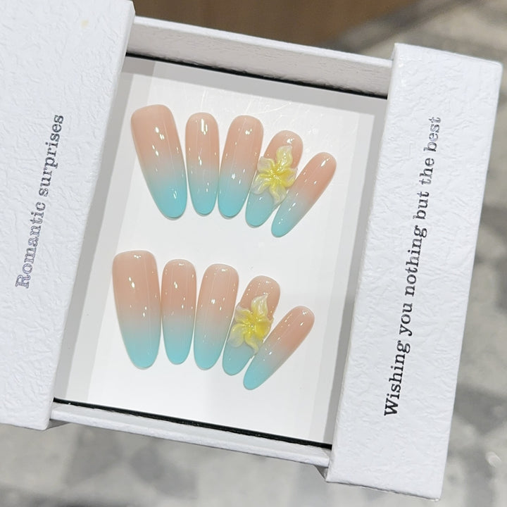 Artificial nails with enchanting ombre effect and floral accents Bowlift