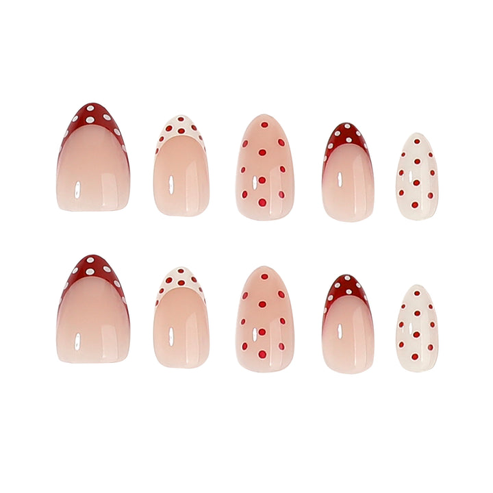 Artful stiletto nails with cute dots and accentuated color gradients Bowlift