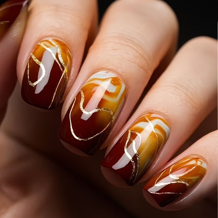 Artificial Nail Set with Marbled Design and Gold Accents Bowlift