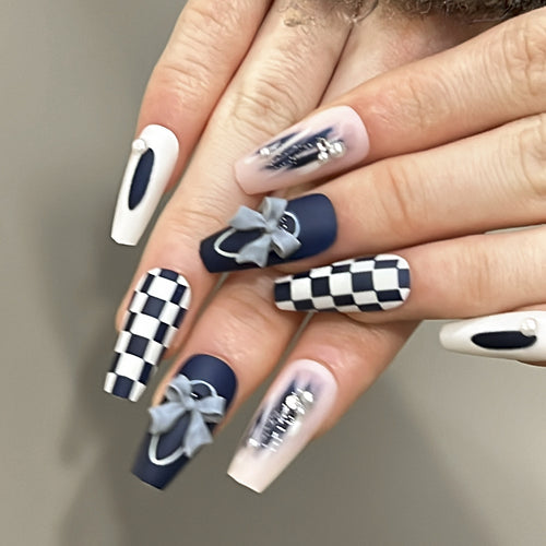 Artful nail decoration with bows and plaid pattern Bowlift