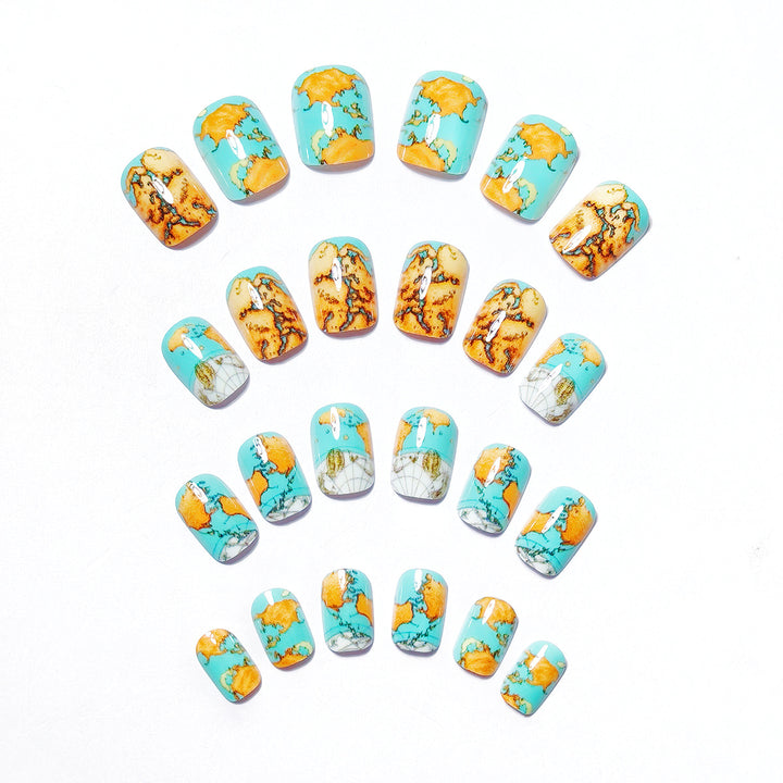 Creative artificial nails with world map inspired design Bowlift