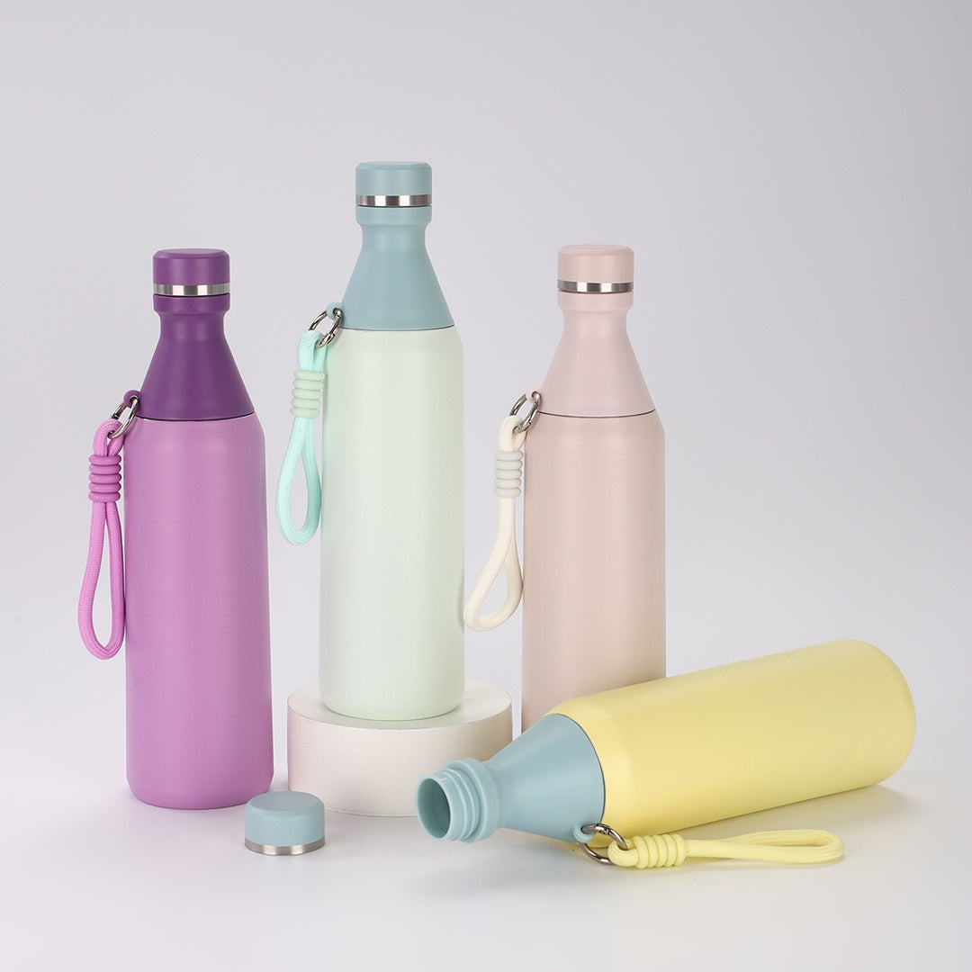 Ladies insulated drinking bottle with practical carrying strap Bowlift