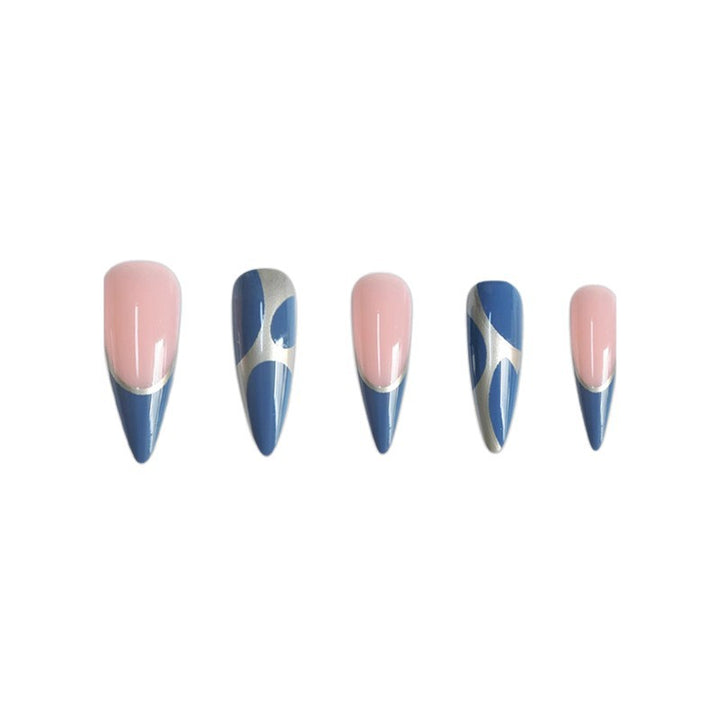 Artistic Stiletto Press-On Nail Design with Metallic Trim Bowlift