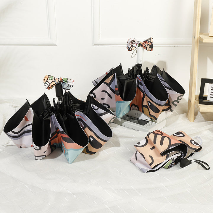 Women's folding umbrella with colorful animal design and durable frame Bowlift