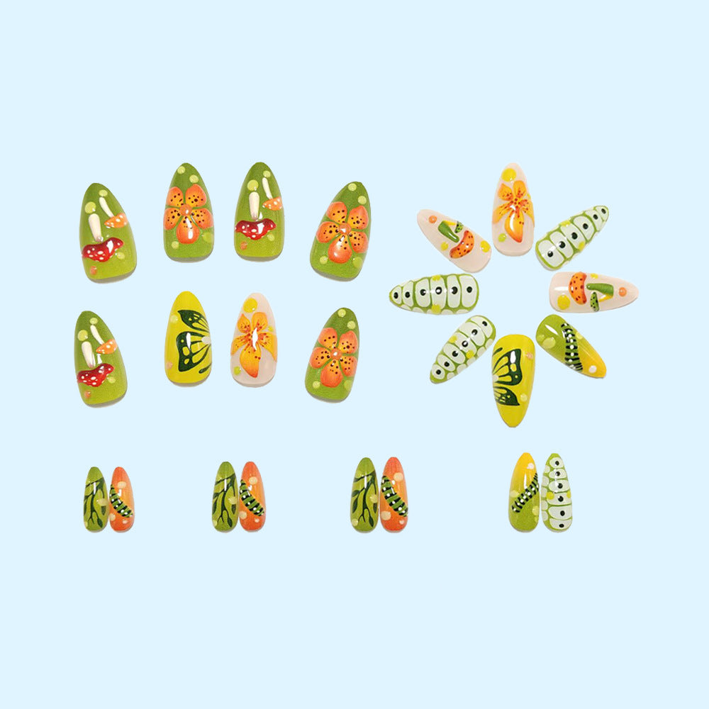 Artificial nails in forest style with floral and mushroom-shaped designs Bowlift