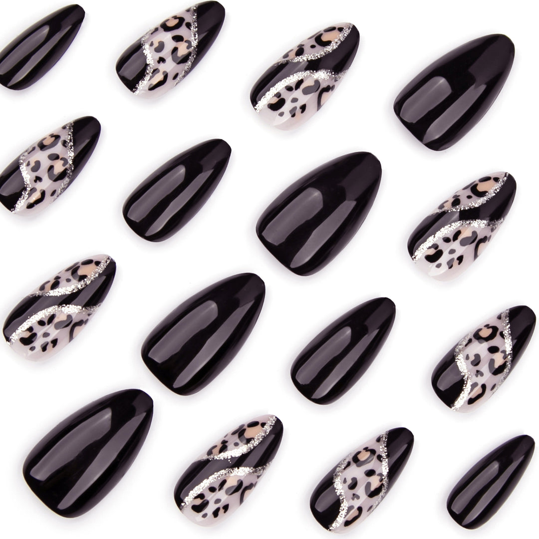 Artistic stiletto nails with leopard design and glitter effects Bowlift