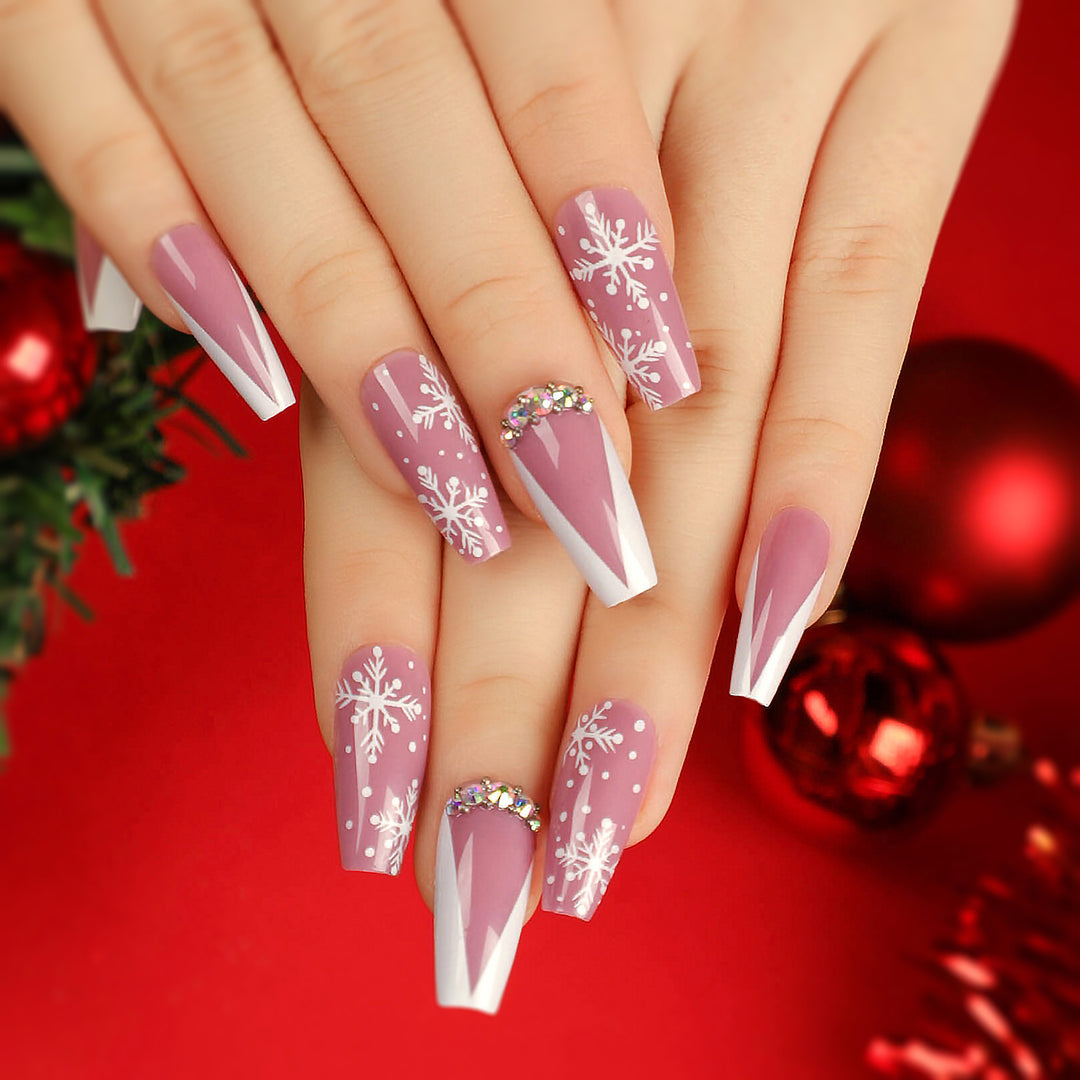 Artistic Nail Extensions with Snowflake Design and Glitter Accents Bowlift